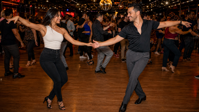 Latin Hustle dancing